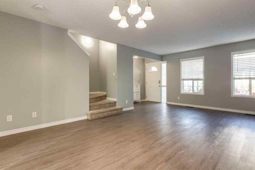 MLS® A2267778 - Unit #5 135 Bow Ridge Drive  in Bow Ridge Cochrane, Residential