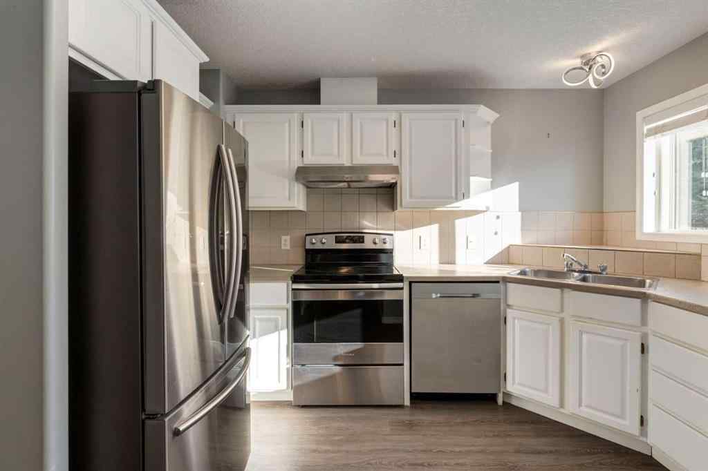 MLS® A2267778 - Unit #5 135 Bow Ridge Drive  in Bow Ridge Cochrane, Residential