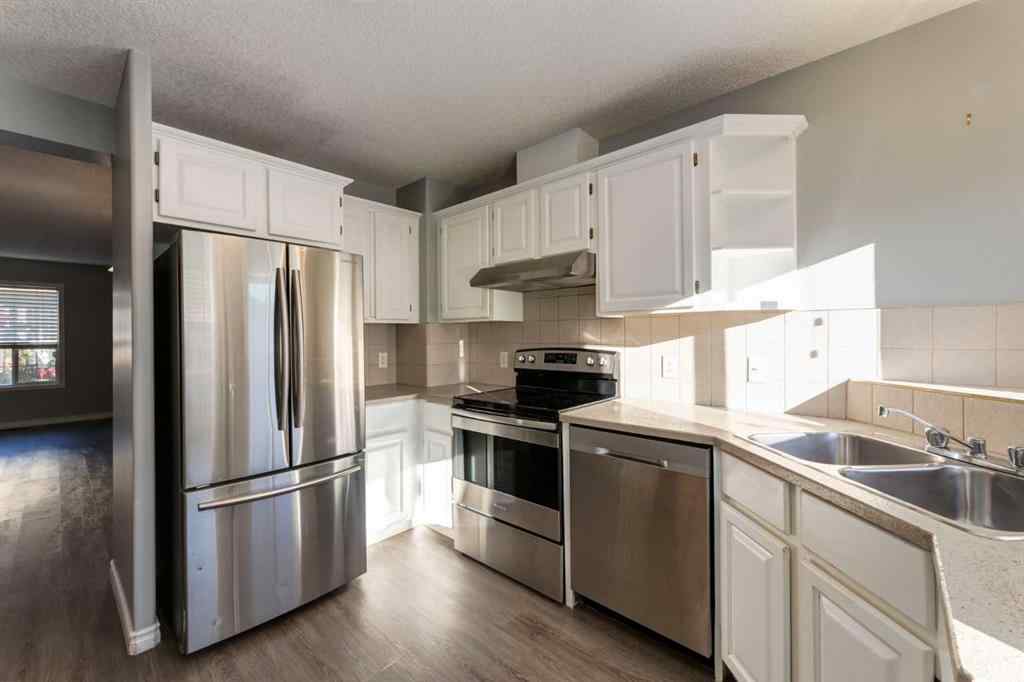 MLS® A2267778 - Unit #5 135 Bow Ridge Drive  in Bow Ridge Cochrane, Residential