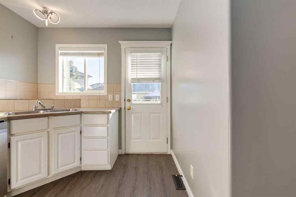 MLS® A2267778 - Unit #5 135 Bow Ridge Drive  in Bow Ridge Cochrane, Residential