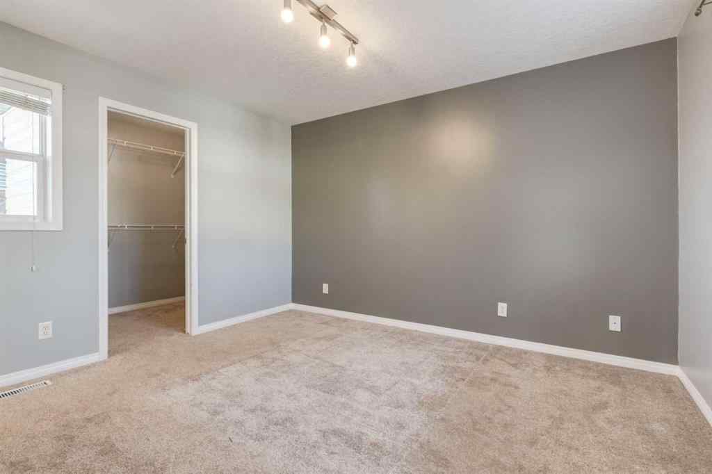 MLS® A2267778 - Unit #5 135 Bow Ridge Drive  in Bow Ridge Cochrane, Residential