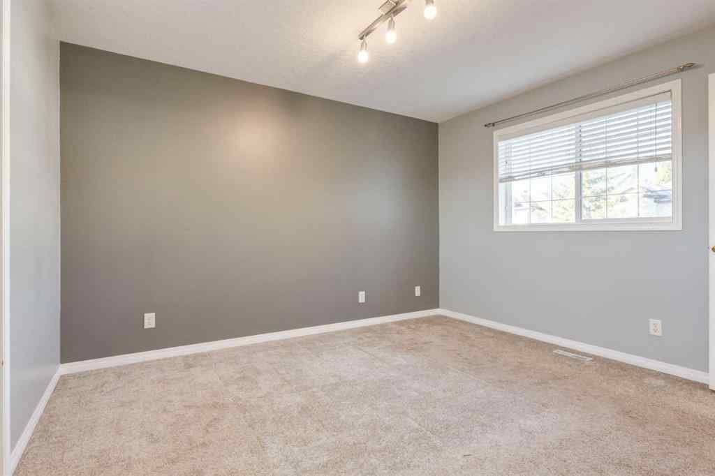 MLS® A2267778 - Unit #5 135 Bow Ridge Drive  in Bow Ridge Cochrane, Residential