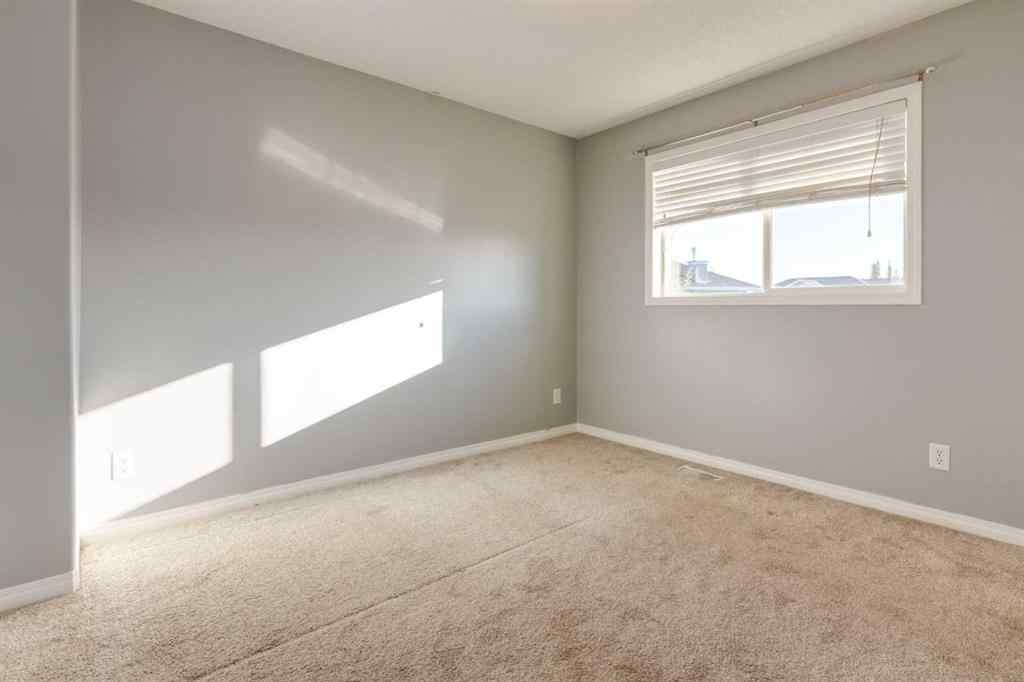 MLS® A2267778 - Unit #5 135 Bow Ridge Drive  in Bow Ridge Cochrane, Residential