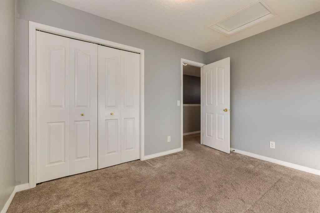MLS® A2267778 - Unit #5 135 Bow Ridge Drive  in Bow Ridge Cochrane, Residential
