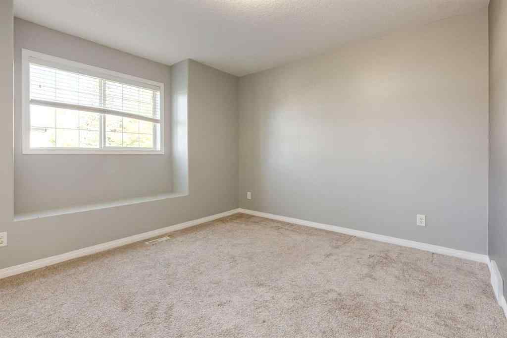 MLS® A2267778 - Unit #5 135 Bow Ridge Drive  in Bow Ridge Cochrane, Residential