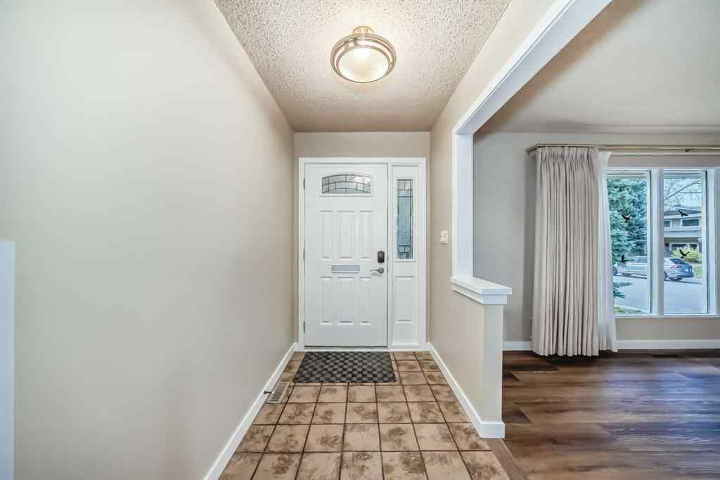 MLS® A2267783 - 255 Parkwood Close SE in Parkland Calgary, Residential