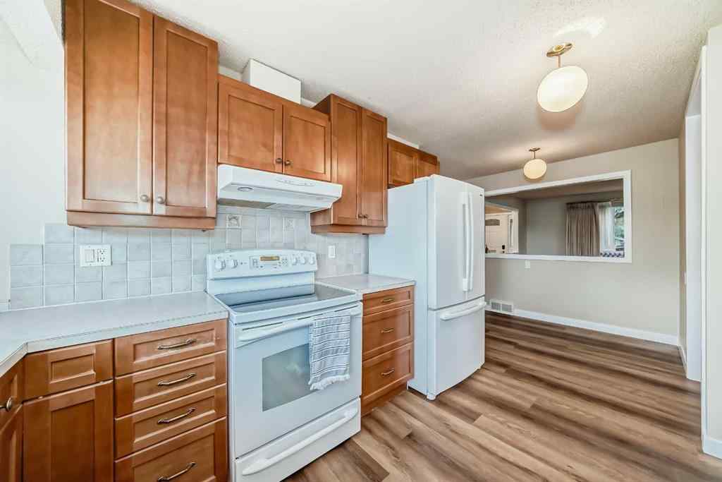 MLS® A2267783 - 255 Parkwood Close SE in Parkland Calgary, Residential