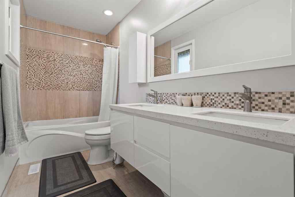 MLS® A2267789 - 124 Canterbury Drive SW in Canyon Meadows Calgary, Residential