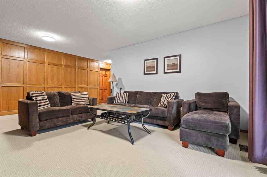 MLS® A2267789 - 124 Canterbury Drive SW in Canyon Meadows Calgary, Residential