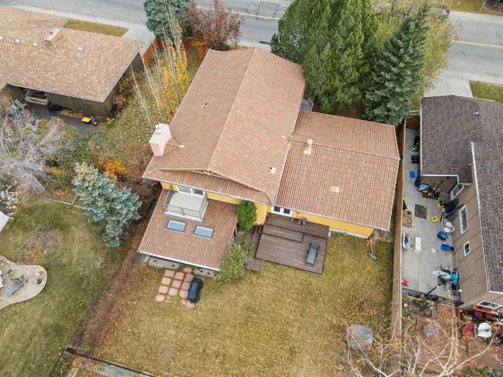 MLS® A2267789 - 124 Canterbury Drive SW in Canyon Meadows Calgary, Residential
