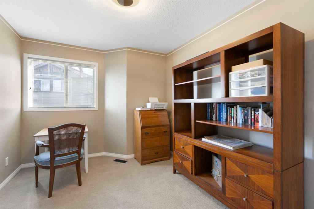 MLS® A2267796 - 90 Cimarron Trail  in Cimarron Okotoks, Residential