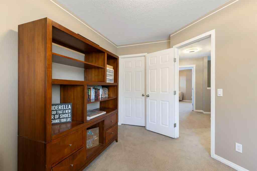 MLS® A2267796 - 90 Cimarron Trail  in Cimarron Okotoks, Residential