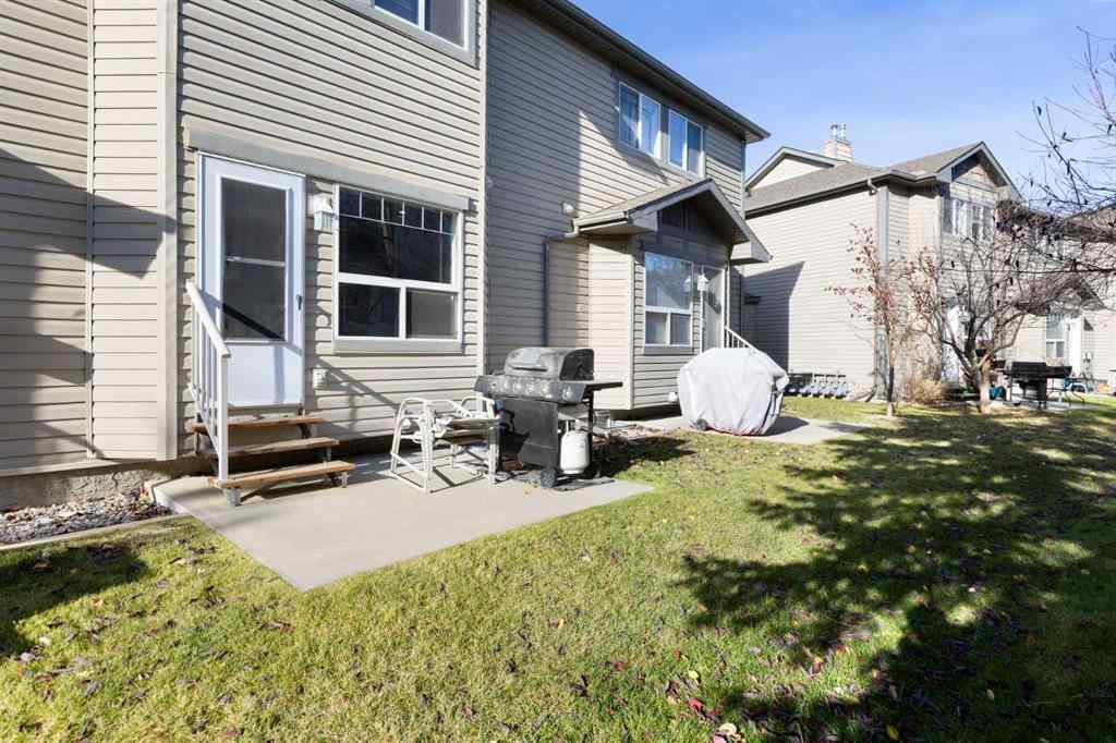 MLS® A2267796 - 90 Cimarron Trail  in Cimarron Okotoks, Residential