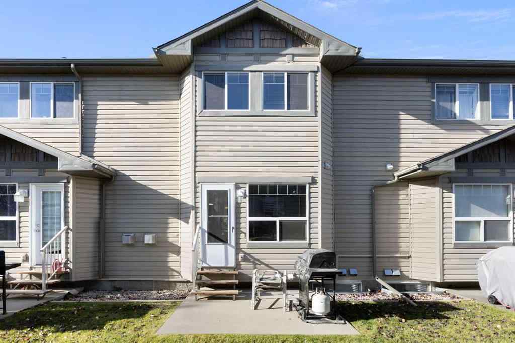 MLS® A2267796 - 90 Cimarron Trail  in Cimarron Okotoks, Residential