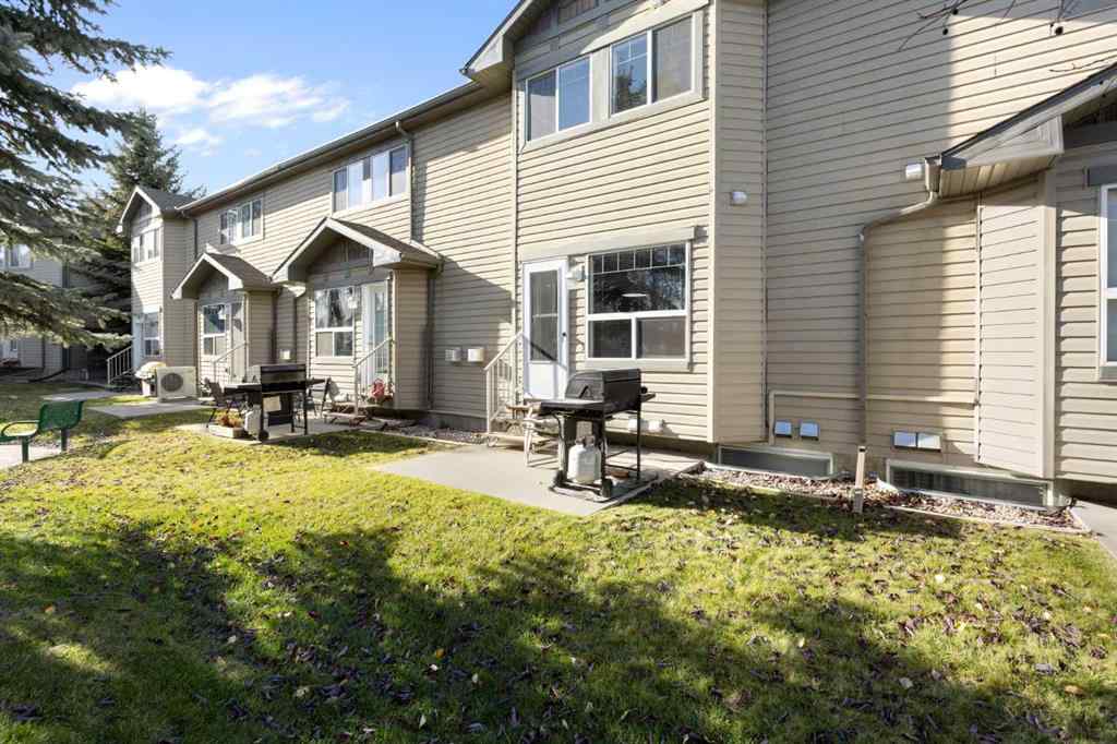 MLS® A2267796 - 90 Cimarron Trail  in Cimarron Okotoks, Residential