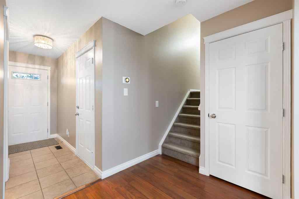 MLS® A2267796 - 90 Cimarron Trail  in Cimarron Okotoks, Residential