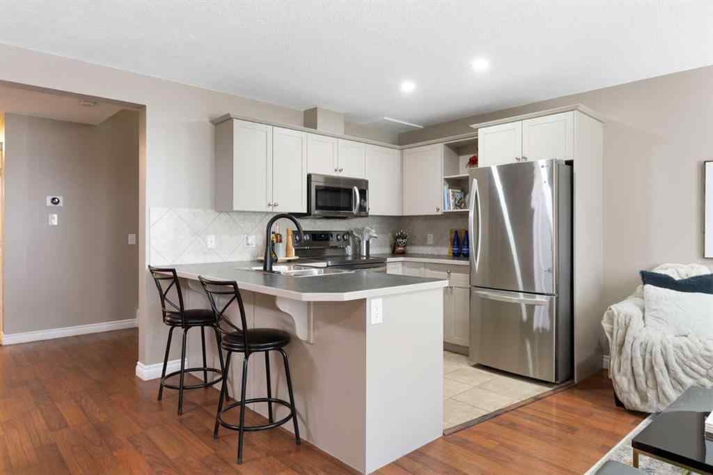 MLS® A2267796 - 90 Cimarron Trail  in Cimarron Okotoks, Residential