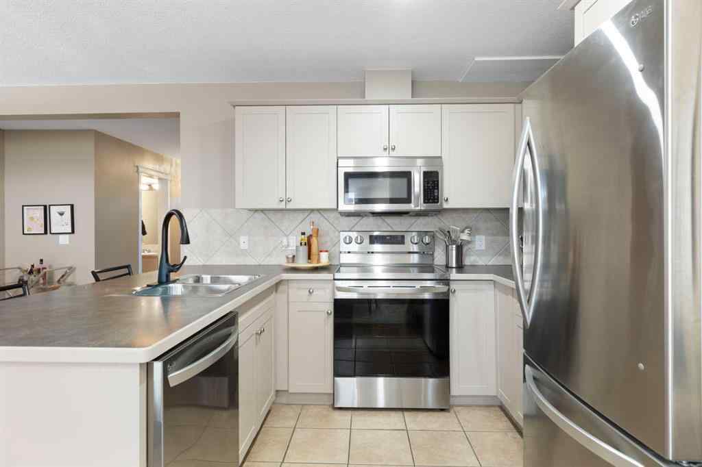 MLS® A2267796 - 90 Cimarron Trail  in Cimarron Okotoks, Residential