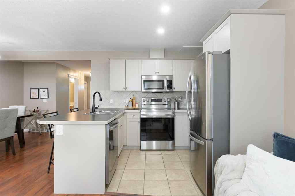 MLS® A2267796 - 90 Cimarron Trail  in Cimarron Okotoks, Residential