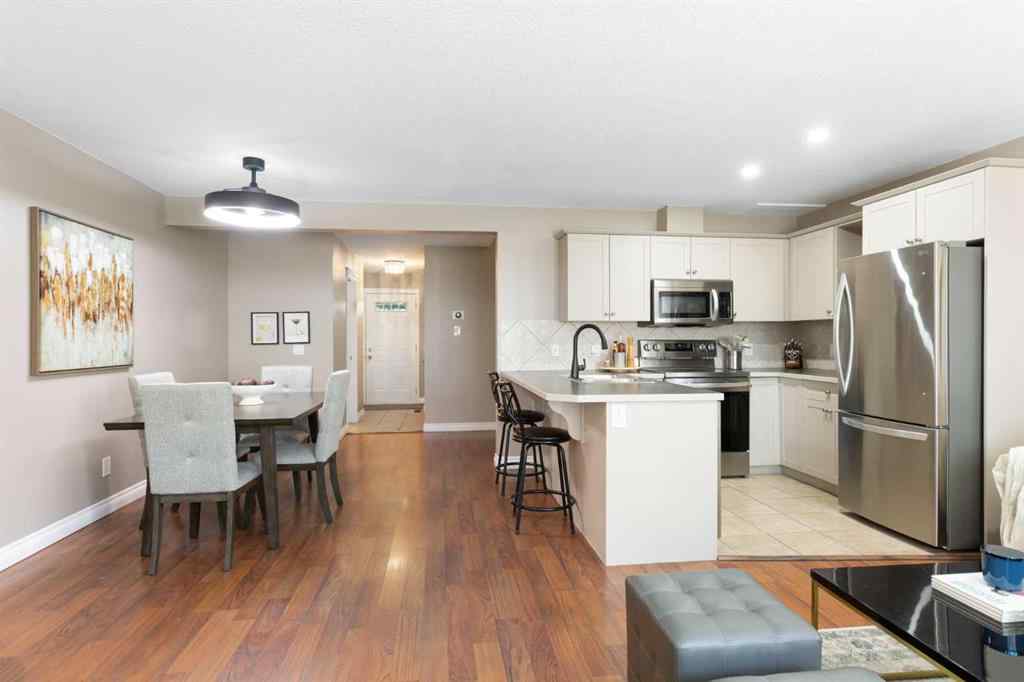 MLS® A2267796 - 90 Cimarron Trail  in Cimarron Okotoks, Residential