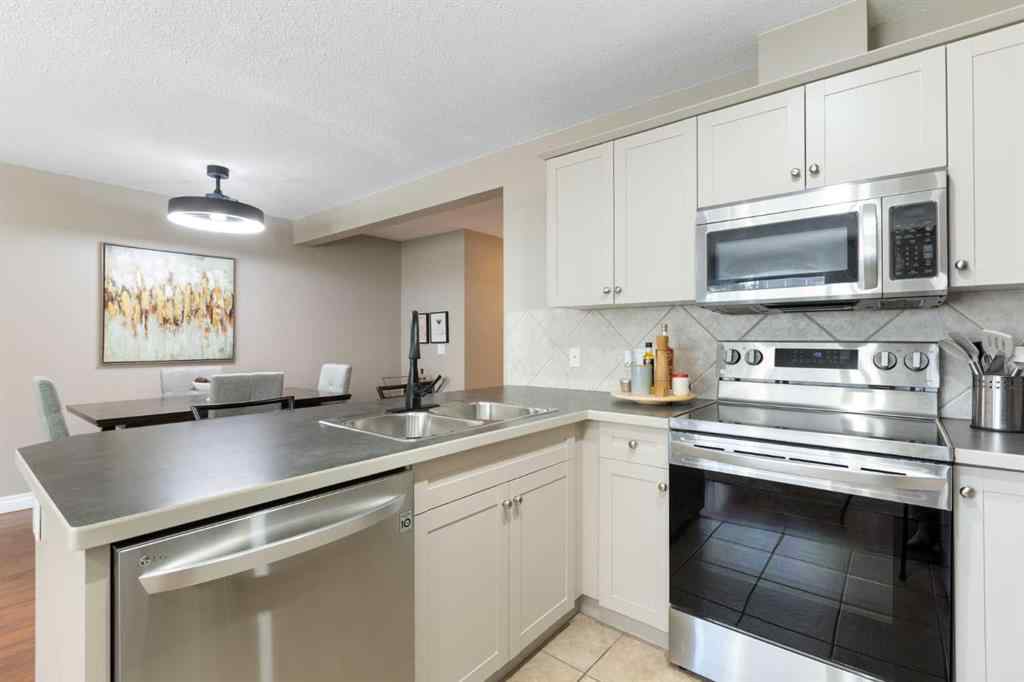 MLS® A2267796 - 90 Cimarron Trail  in Cimarron Okotoks, Residential