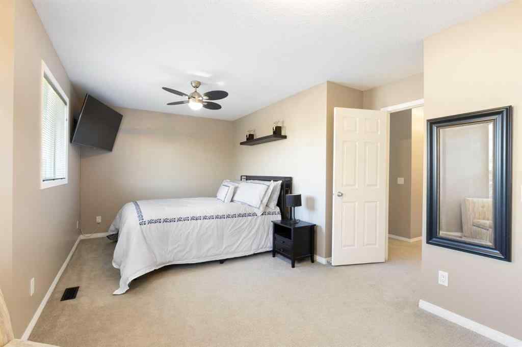 MLS® A2267796 - 90 Cimarron Trail  in Cimarron Okotoks, Residential