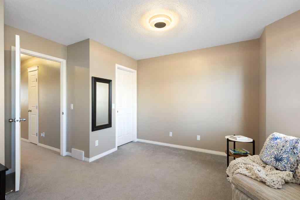 MLS® A2267796 - 90 Cimarron Trail  in Cimarron Okotoks, Residential