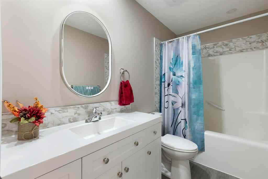 MLS® A2267796 - 90 Cimarron Trail  in Cimarron Okotoks, Residential