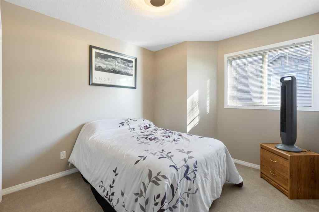 MLS® A2267796 - 90 Cimarron Trail  in Cimarron Okotoks, Residential