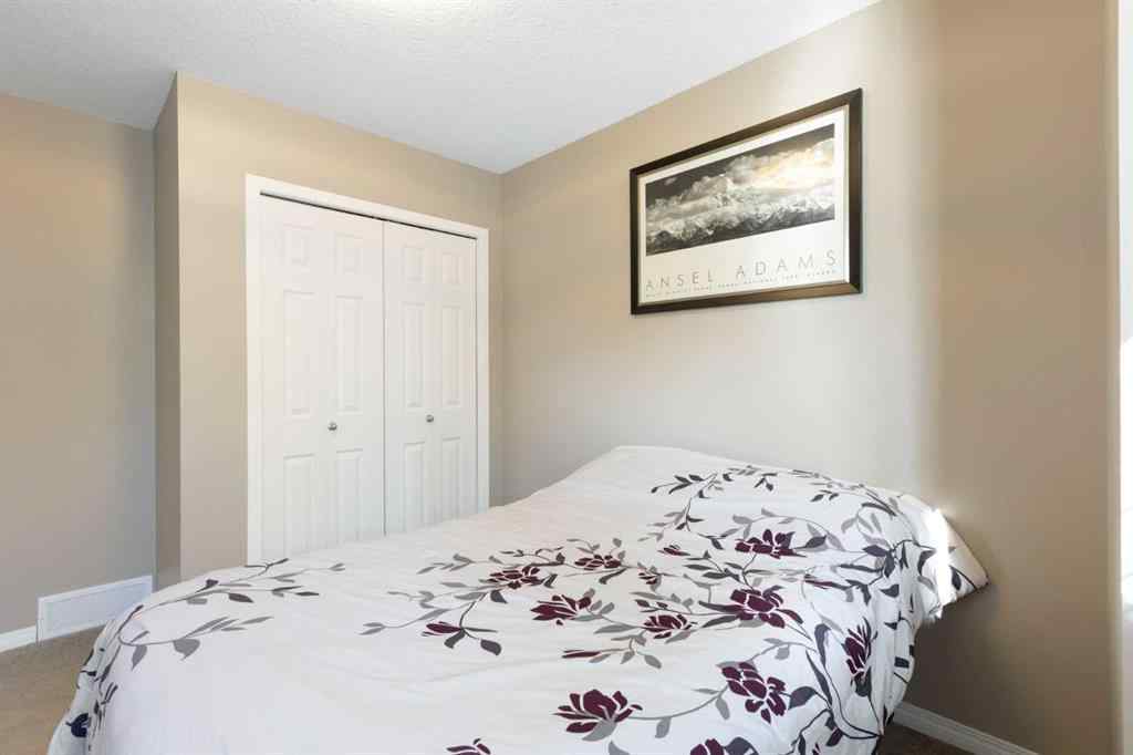 MLS® A2267796 - 90 Cimarron Trail  in Cimarron Okotoks, Residential
