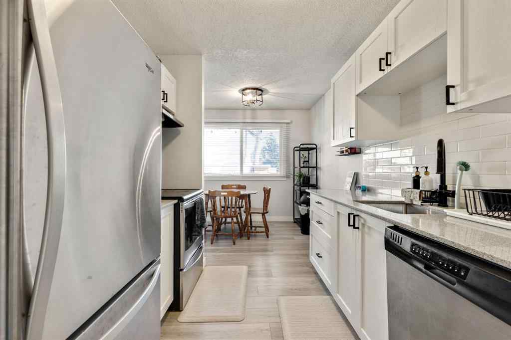 MLS® A2267798 - Unit #1 6412 4 Street NE in Thorncliffe Calgary, Residential