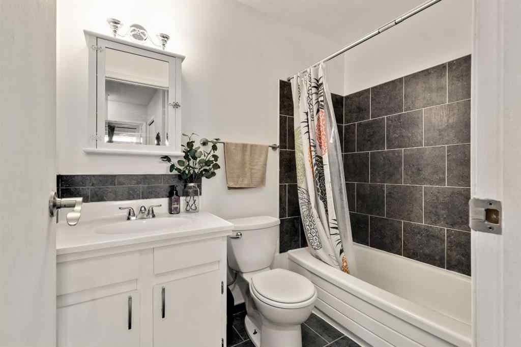 MLS® A2267798 - Unit #1 6412 4 Street NE in Thorncliffe Calgary, Residential
