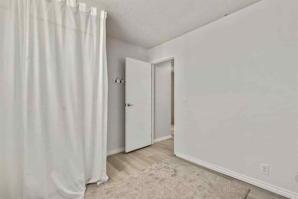 MLS® A2267798 - Unit #1 6412 4 Street NE in Thorncliffe Calgary, Residential