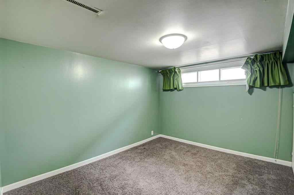 MLS® A2267837 - 6011 Centre Street NW in Thorncliffe Calgary, Residential