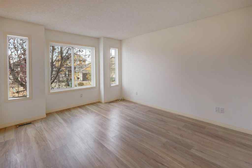 MLS® A2267846 - 104 Saddlemead Road NE in Saddle Ridge Calgary, Residential