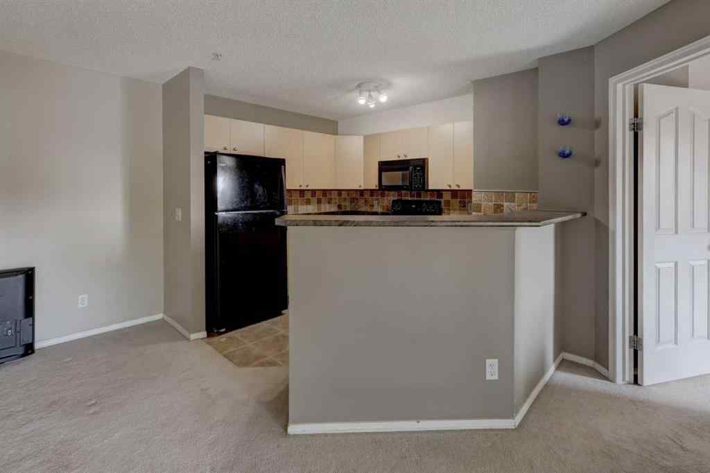 MLS® A2267849 - Unit #8118 304 Mackenzie Way SW in Downtown Airdrie, Residential