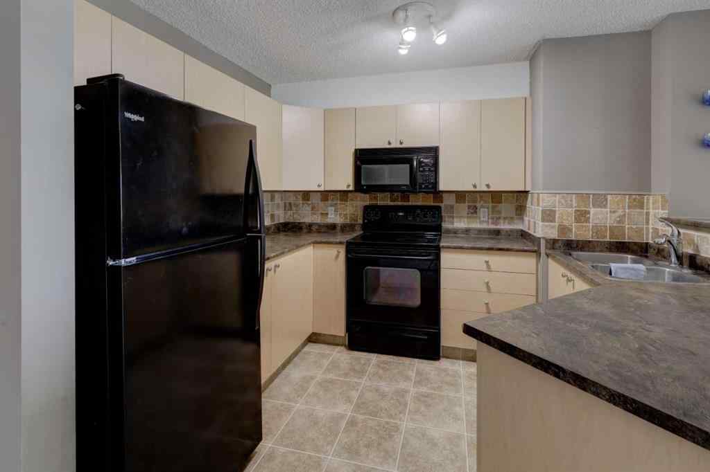 MLS® A2267849 - Unit #8118 304 Mackenzie Way SW in Downtown Airdrie, Residential