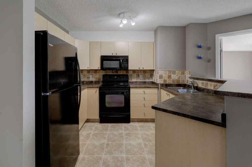 MLS® A2267849 - Unit #8118 304 Mackenzie Way SW in Downtown Airdrie, Residential
