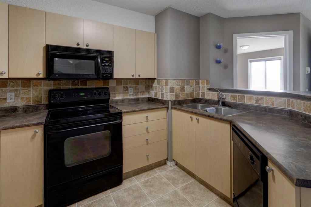 MLS® A2267849 - Unit #8118 304 Mackenzie Way SW in Downtown Airdrie, Residential
