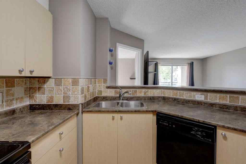 MLS® A2267849 - Unit #8118 304 Mackenzie Way SW in Downtown Airdrie, Residential
