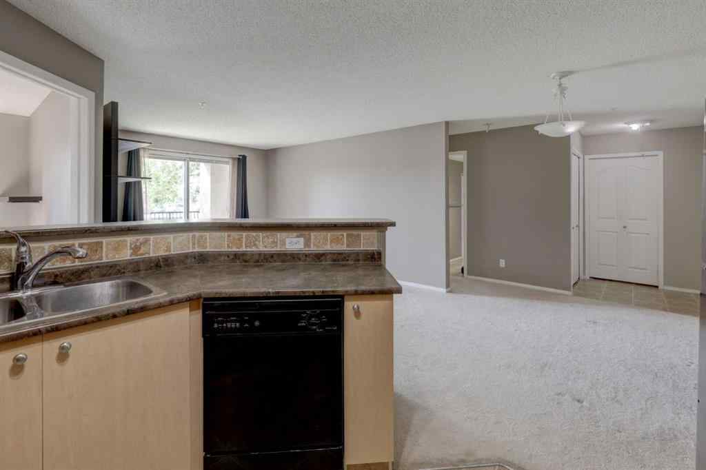 MLS® A2267849 - Unit #8118 304 Mackenzie Way SW in Downtown Airdrie, Residential