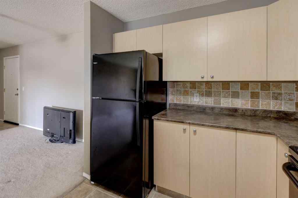 MLS® A2267849 - Unit #8118 304 Mackenzie Way SW in Downtown Airdrie, Residential