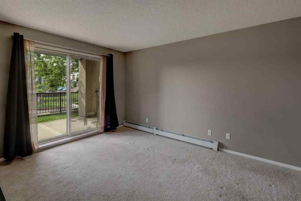 MLS® A2267849 - Unit #8118 304 Mackenzie Way SW in Downtown Airdrie, Residential
