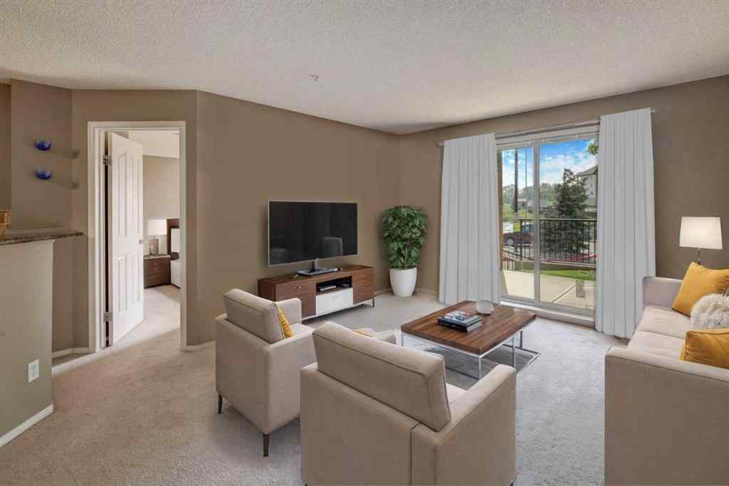 MLS® A2267849 - Unit #8118 304 Mackenzie Way SW in Downtown Airdrie, Residential