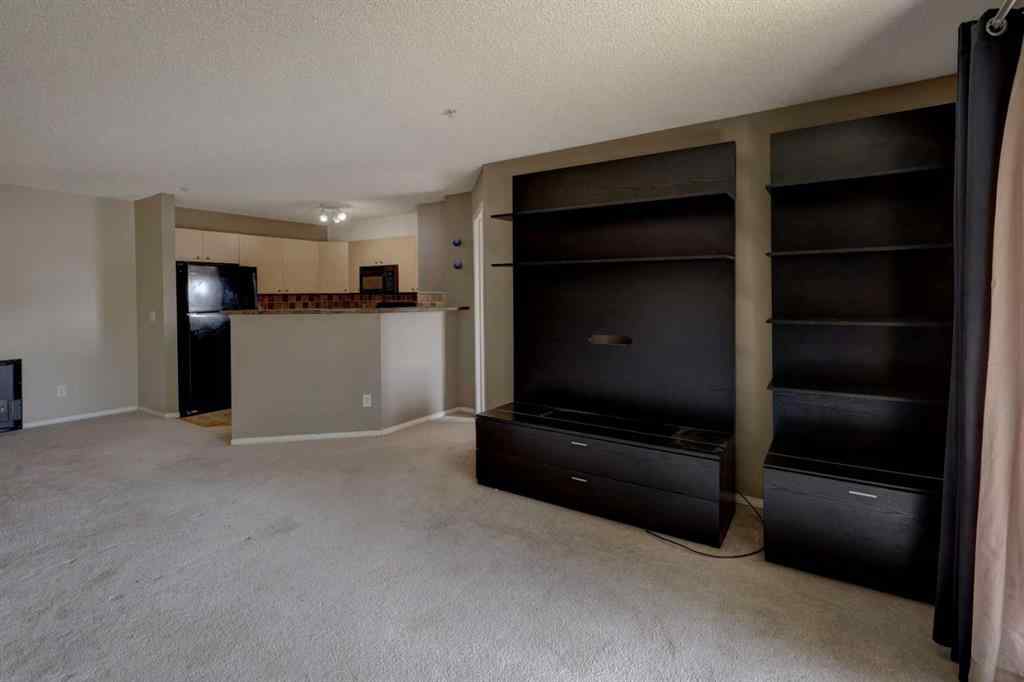 MLS® A2267849 - Unit #8118 304 Mackenzie Way SW in Downtown Airdrie, Residential
