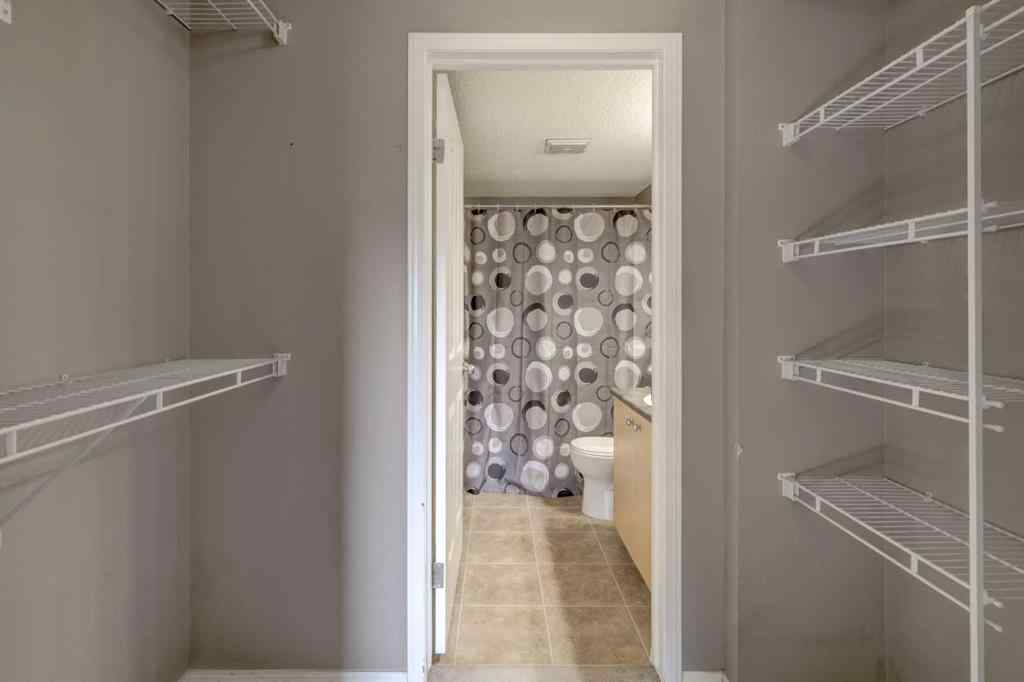 MLS® A2267849 - Unit #8118 304 Mackenzie Way SW in Downtown Airdrie, Residential