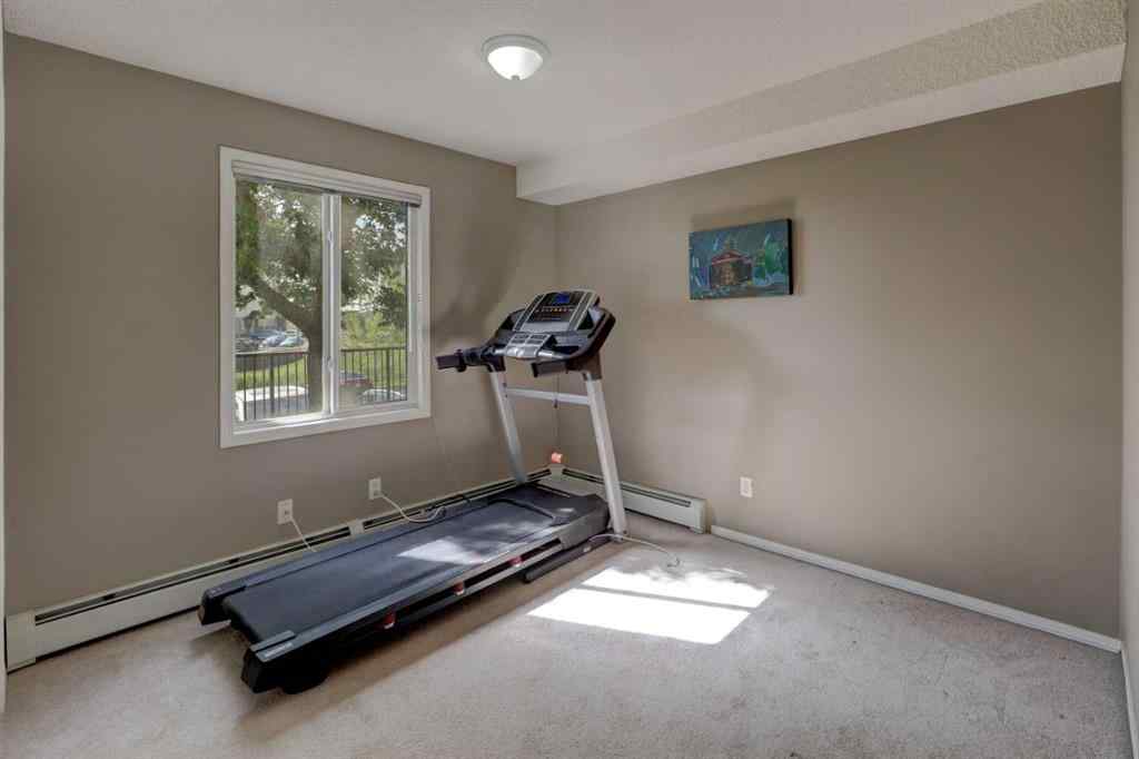 MLS® A2267849 - Unit #8118 304 Mackenzie Way SW in Downtown Airdrie, Residential