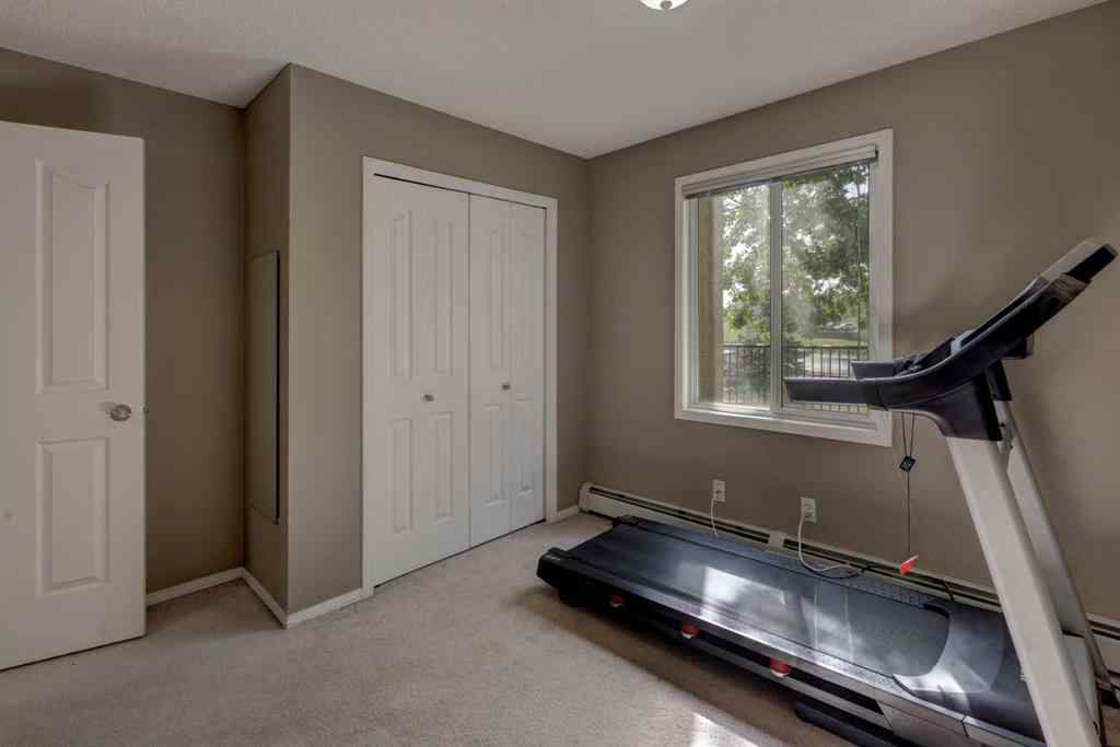 MLS® A2267849 - Unit #8118 304 Mackenzie Way SW in Downtown Airdrie, Residential