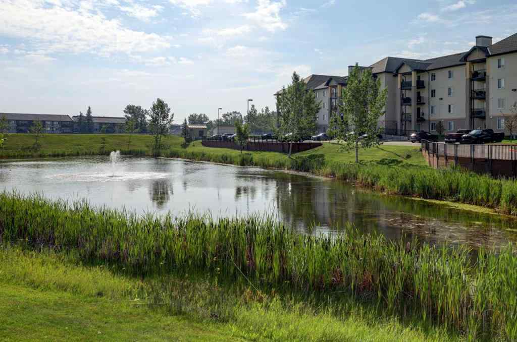 MLS® A2267849 - Unit #8118 304 Mackenzie Way SW in Downtown Airdrie, Residential
