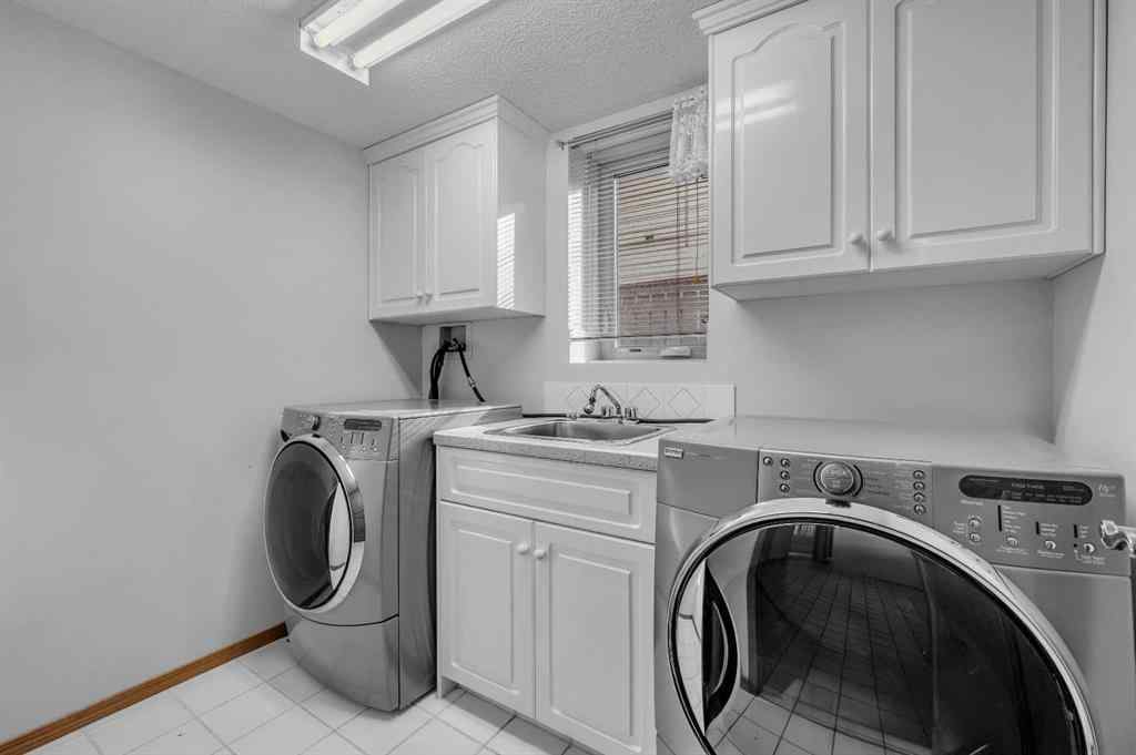 MLS® A2267869 - 13895 Evergreen Street SW in Evergreen Calgary, Residential